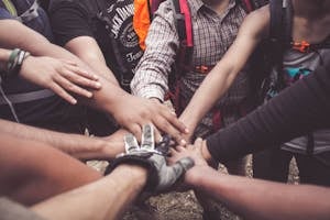 People Doing Group Hand Cheer